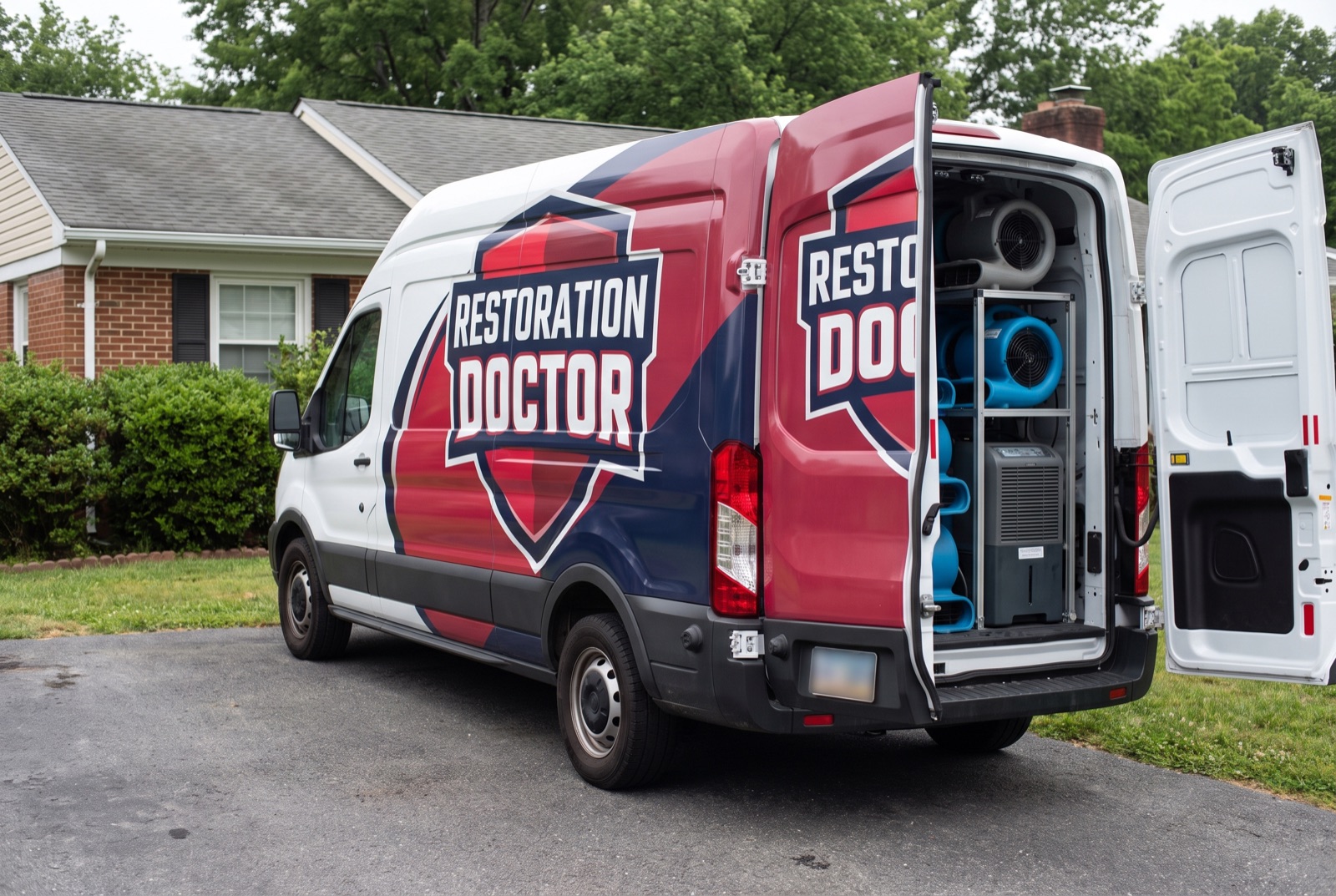 Restoration Doctor van loaded with drying equipment — illustrating: can electronics and belongings be saved after a fire
