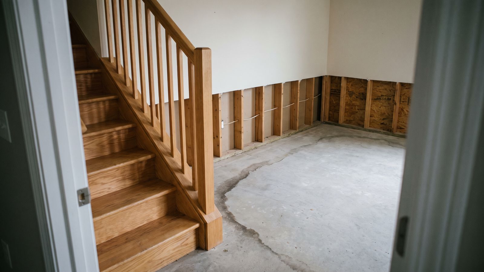 Two-foot flood cut above a stripped basement slab Drywall cut two feet up to bare studs above a stripped basement slab: does homeowners insurance cover sewage backup