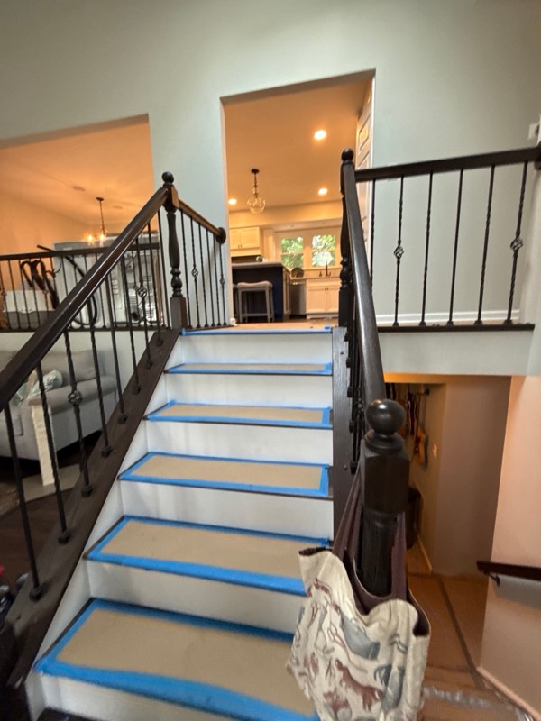 Centreville, VA home during emergency flood response with drying protection on the staircase