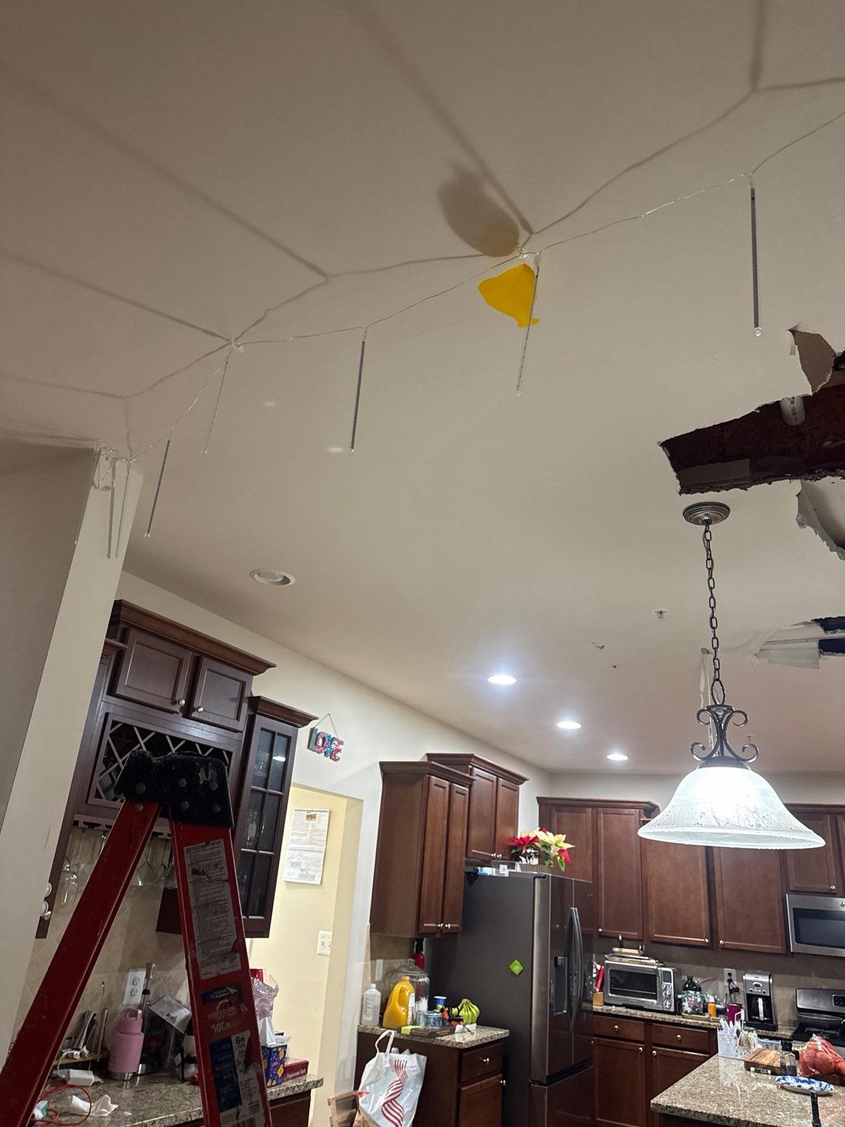 Before restoration: kitchen ceiling water damage restoration on a documented Waldorf, MD restoration project by Restoration Doctor.