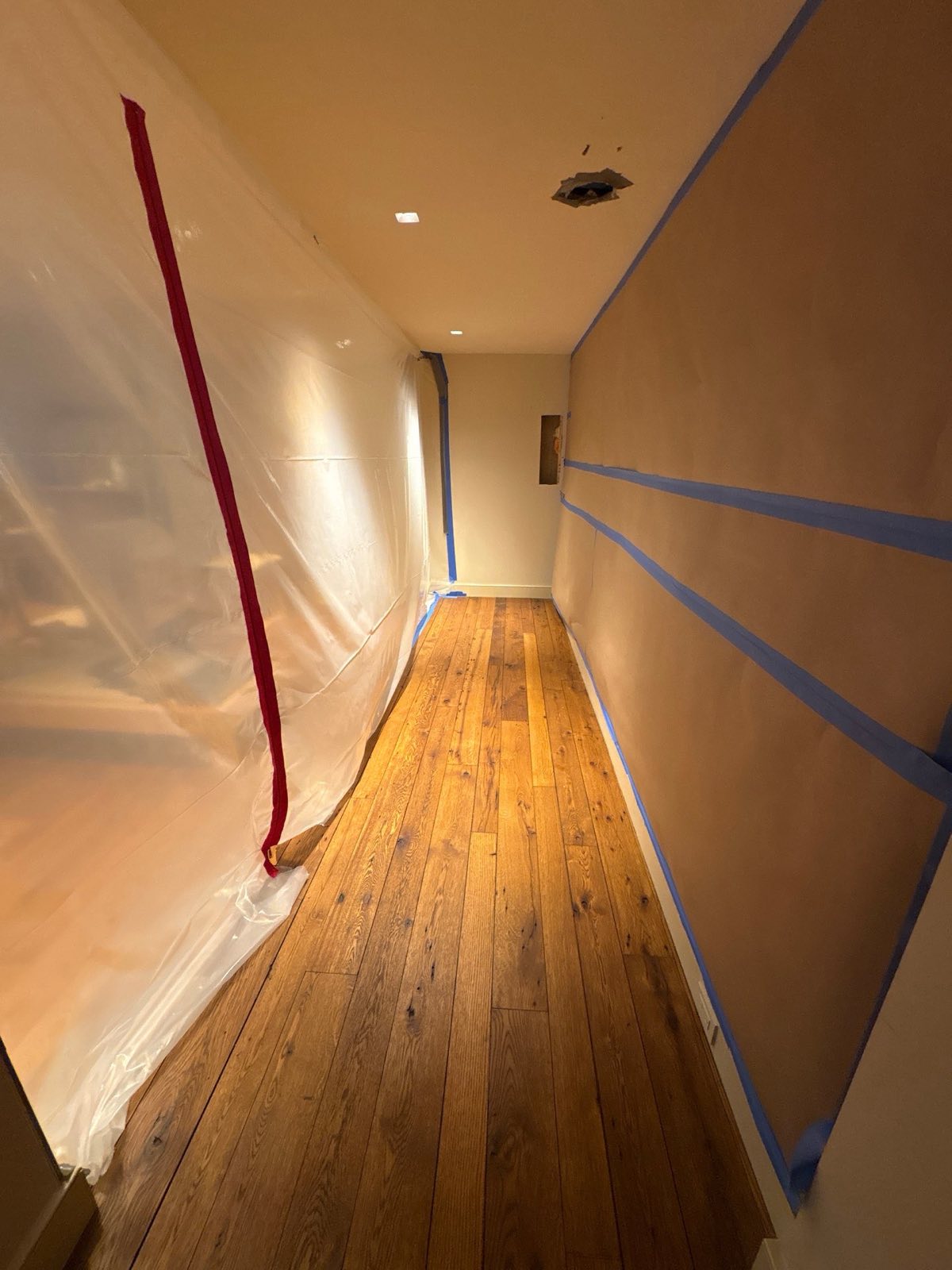 Containment and floor protection during water damage mitigation and structural drying on a documented Restoration Doctor project