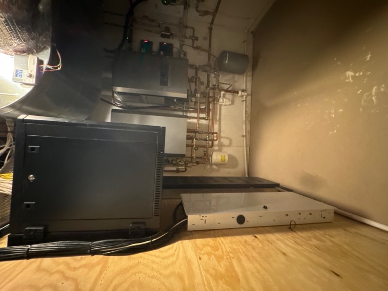 Mechanical-room water source documented before mitigation and structural drying on a Restoration Doctor project